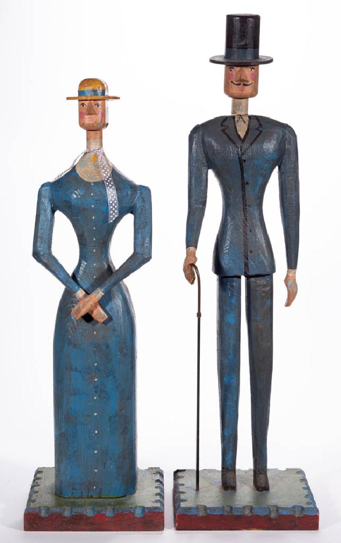 CURTIS JERE CARVED AND PAINTED WOOD FIGURES, LOT OF TWO: CURTIS JERE CARVED AND PAINTED WOOD FIGURES, LOT OF TWO, each signed on the base "Â© C. Jere / 1982". Retain an old-painted surface. 1982. 30 3/4" and 33 3/4" H.Very good overall condition, old repa