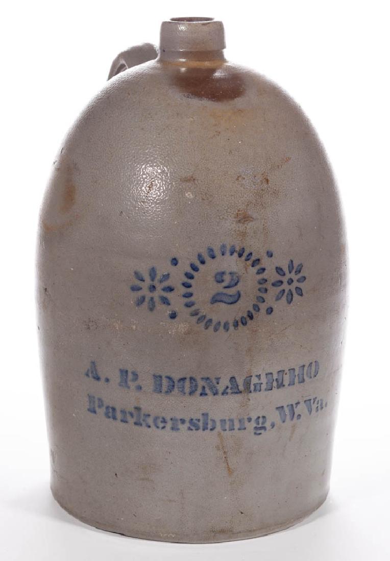 STENCILED "A. P. DONAGHHO / PARKERSBURG. W.VA.", WEST: STENCILED "A. P. DONAGHHO / PARKERSBURG. W.VA.", WEST VIRGINIA STONEWARE JUG, salt-glazed, "2" gallon capacity, slightly ovoid form with plain mouth, and strap handle with thumb-pressed lower terminal