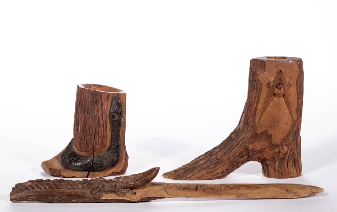 LOOKOUT MOUNTAIN, TENNESSEE SOUVENIR FOLK ART CARVED: LOOKOUT MOUNTAIN, TENNESSEE SOUVENIR FOLK ART CARVED ARTICLES, LOT OF THREE, comprising two match holders, including a boot form bearing Masonic iconography, and a letter opener with alligator handle,