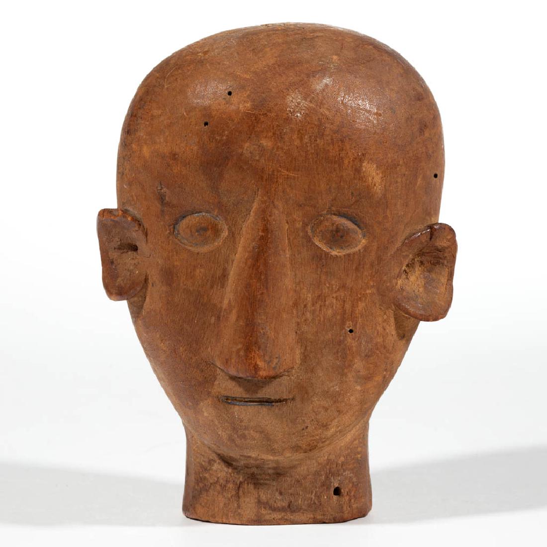SOUTHERN FOLK ART CARVED BUST OF A MAN: SOUTHERN FOLK ART CARVED BUST OF A MAN, probably poplar, figure with bald head and exaggerated features, no signature located. Dry, natural surface. Late 19th/first quarter 20th century. 5 1/4" HOA. V