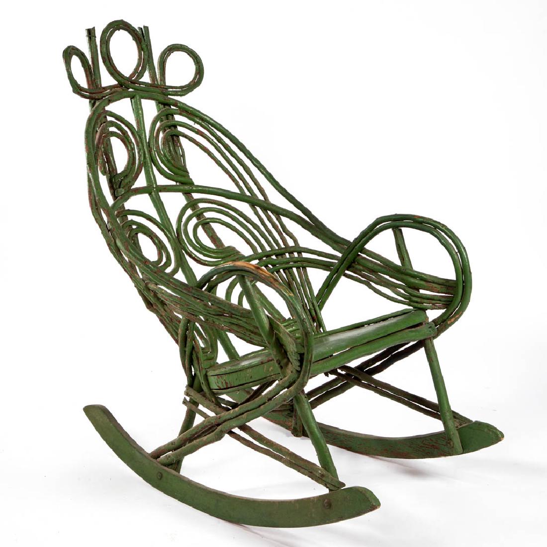 AMERICAN RUSTIC PAINTED TWIG ROCKER: AMERICAN RUSTIC PAINTED TWIG ROCKER, extensive bentwood elements, plank seat, and old green-painted surface over earlier red. Late 19th/early 20th century. 39" HOA, 15 1/2" x 18" seat.Good overall con