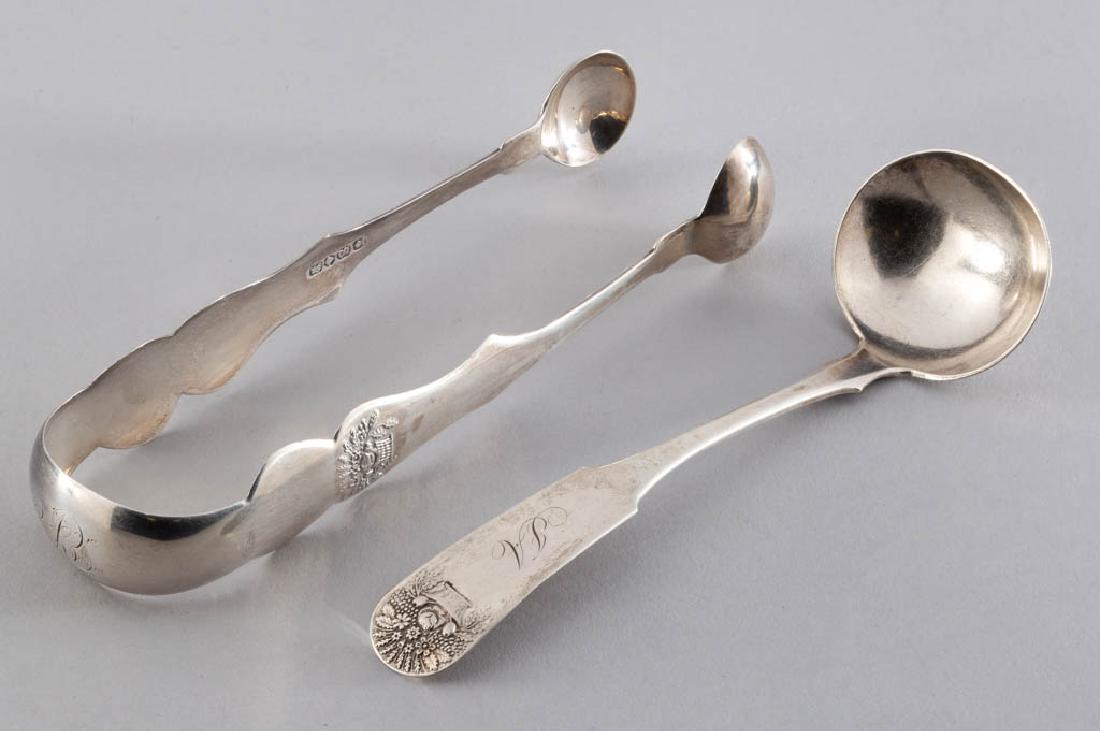 NEW YORK CITY, NEW YORK BASKET OF FLOWERS COIN SILVER: NEW YORK CITY, NEW YORK BASKET OF FLOWERS COIN SILVER SERVING UTENSILS, LOT OF TWO, both having fiddle handles with basket of flowers motifs to tips and personalized engravings, comprising a cream lad