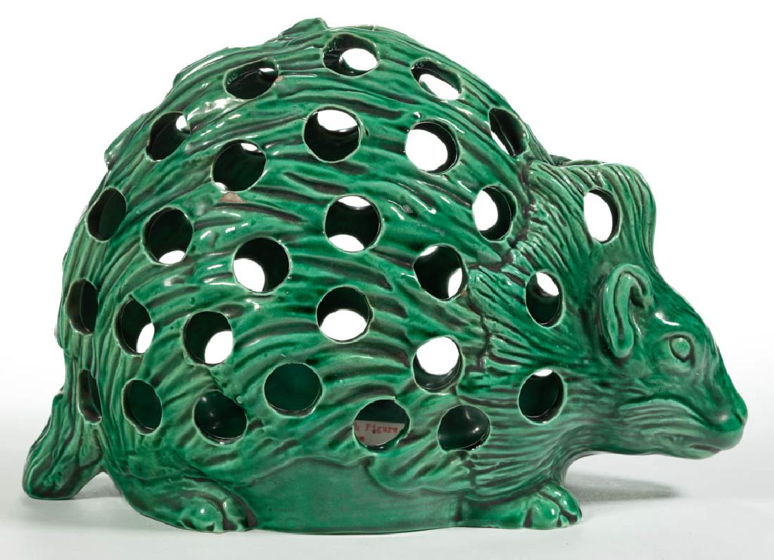 WEDGWOOD CERAMIC BULB POT / FLOWER FROG: WEDGWOOD CERAMIC BULB POT / FLOWER FROG, in the shape of a hedgehog or porcupine, decorated in rich green glaze with pierced holes for flower stems, lacking undertray. Impressed "WEDGWOOD" and "O" on 
