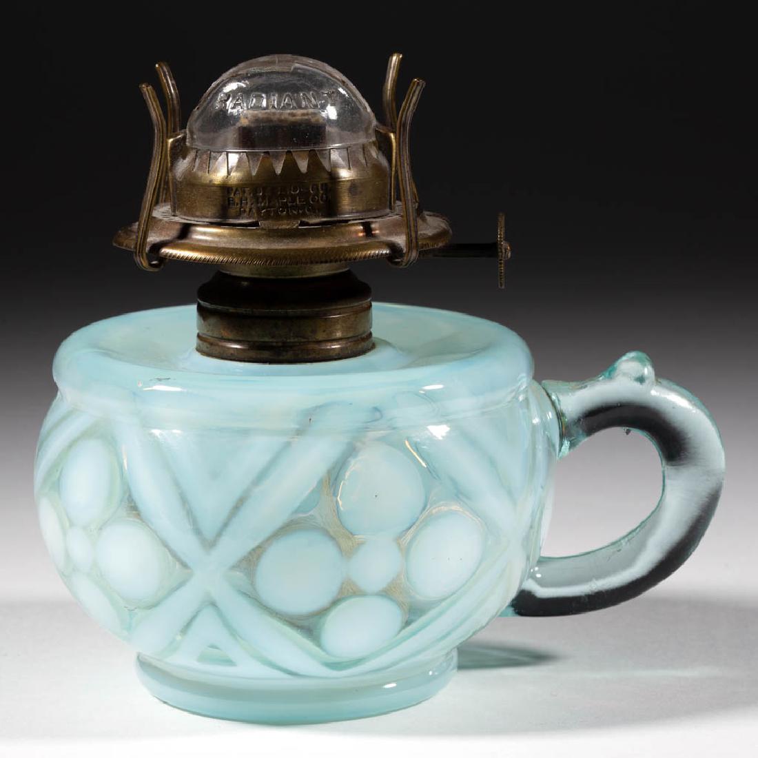 MIX AND MATCH / DIAMOND COINSPOT KEROSENE FINGER LAMP: MIX AND MATCH / DIAMOND COINSPOT KEROSENE FINGER LAMP, pale teal opalescent, molded handle, No. 1 Taplin-Brown collar. Fitted with a No. 1 "RADIANT" burner with a glass top. King Glass Co. Fourth quar