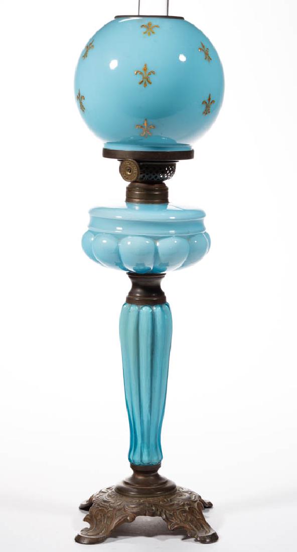 FOSTORIA ELITE PRINCESS THREE-TIER JUNIOR BANQUET LAMP: FOSTORIA ELITE PRINCESS THREE-TIER JUNIOR BANQUET LAMP, cased blue, ribbed stem with brass connectors, cast-metal foot impressed with maker and "58", No. 1 Taplin-Brown collar. Fitted with a Plume & A