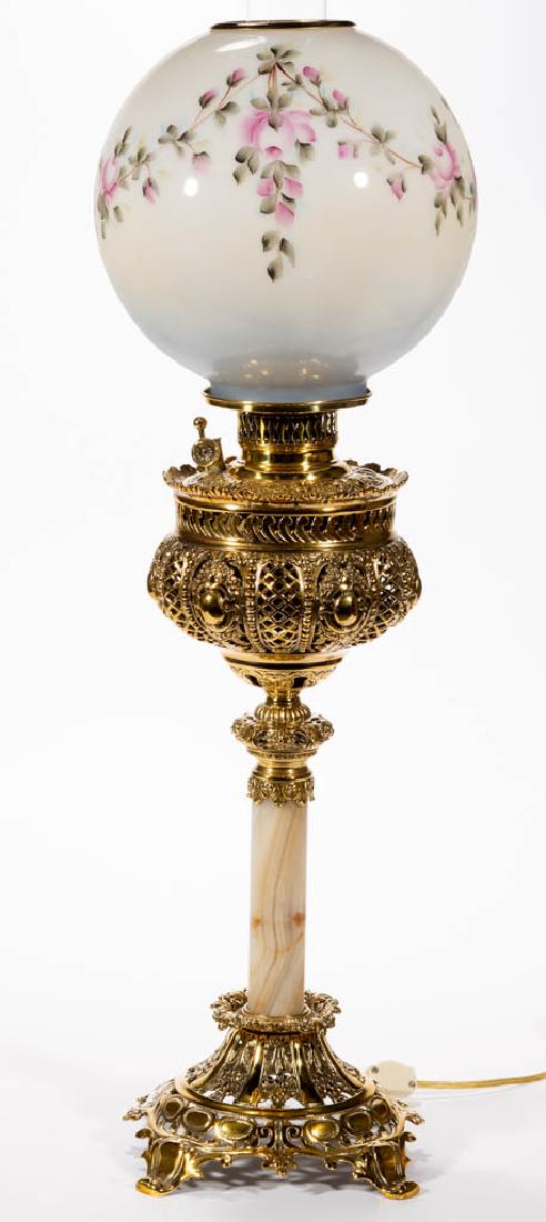 VICTORIAN CAST-METAL AND MARBLE KEROSENE BANQUET LAMP: VICTORIAN CAST-METAL AND MARBLE KEROSENE BANQUET LAMP, opaque white ball shade with polychrome-enamel floral decoration, openwork gothic medallion panels font vase with brass drop-in font, figural gar