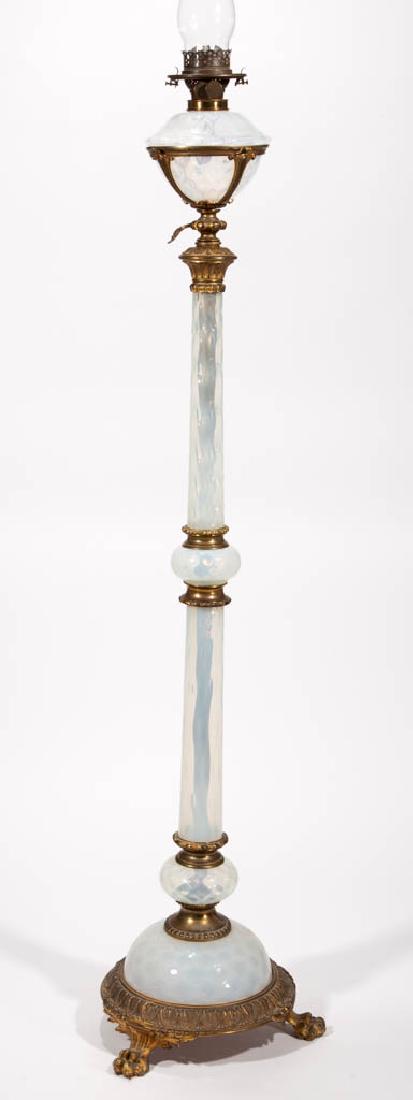 CONTINENTAL DIAMOND-OPTIC OPALESCENT GLASS KEROSENE: CONTINENTAL DIAMOND-OPTIC OPALESCENT GLASS KEROSENE FLOOR / PIANO LAMP, bronze finish, cast-metal openwork font vase fitted with opalescent glass drop-in font, complex stem comprising of two cylindric