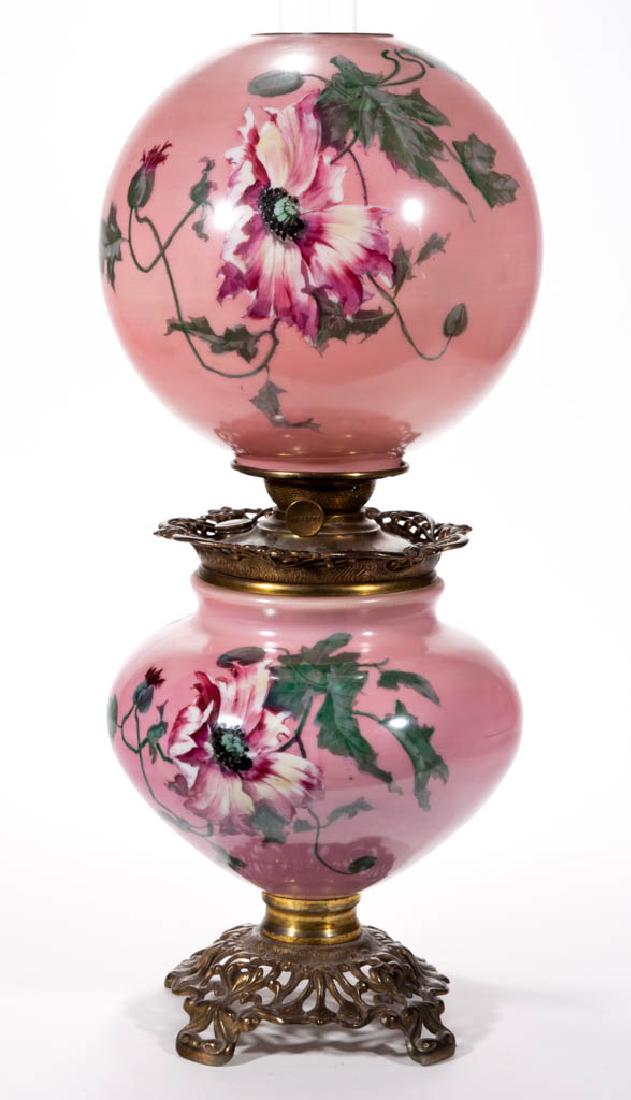 PITTSBURGH ENAMEL-DECORATED GONE WITH THE WIND KEROSENE: PITTSBURGH ENAMEL-DECORATED GONE WITH THE WIND KEROSENE PARLOR LAMP, opaque white/milk glass with a pink ground with polychrome floral decoration, matching decorated ball-form shade with brass heat ri
