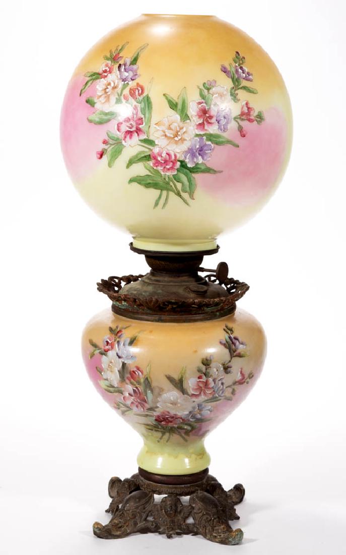 PITTSBURGH ENAMEL-DECORATED KEROSENE GONE WITH THE WIND: PITTSBURGH ENAMEL-DECORATED KEROSENE GONE WITH THE WIND / PARLOR LAMP, opaque white with yellow and pink ground with polychrome-enamel floral decoration, matching decorated ball-form shade, urn-form f