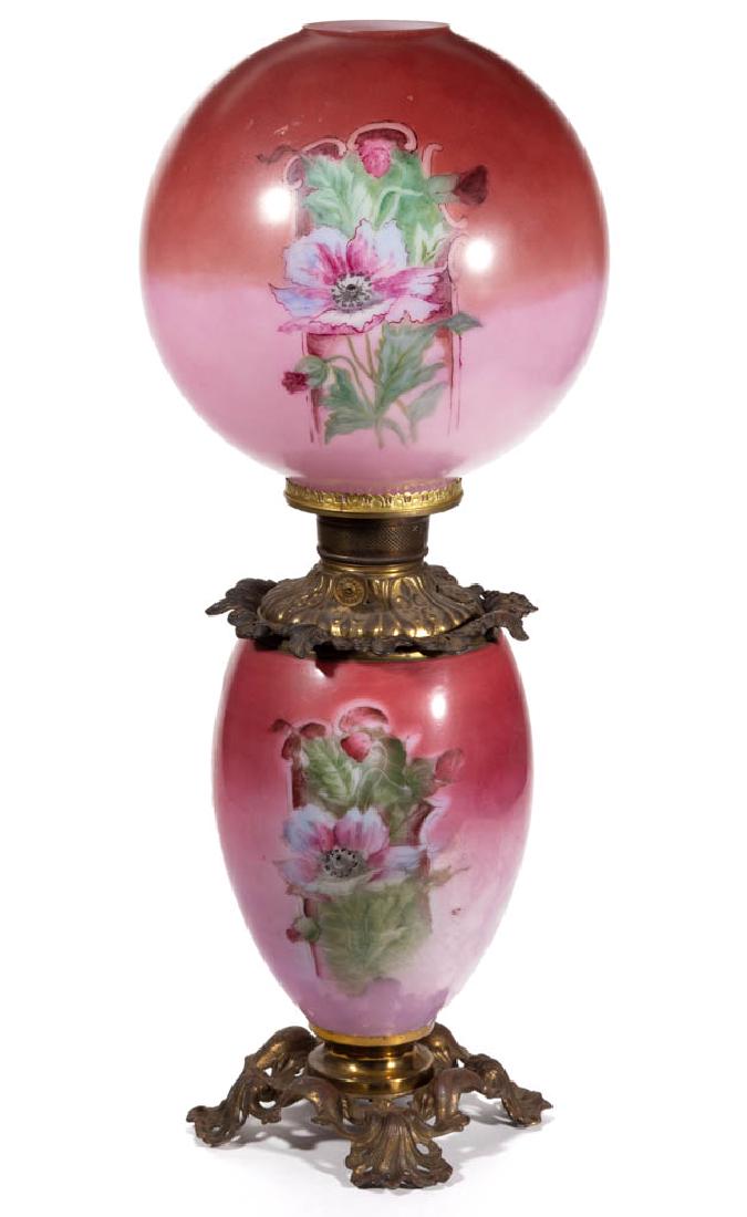 VICTORIAN ENAMEL-DECORATED KEROSENE GONE WITH THE WIND: VICTORIAN ENAMEL-DECORATED KEROSENE GONE WITH THE WIND / PARLOR LAMP, opaque white with rose/pink ground with polychrome-enamel floral decoration, matching decorated ball-form shade, elongated font va