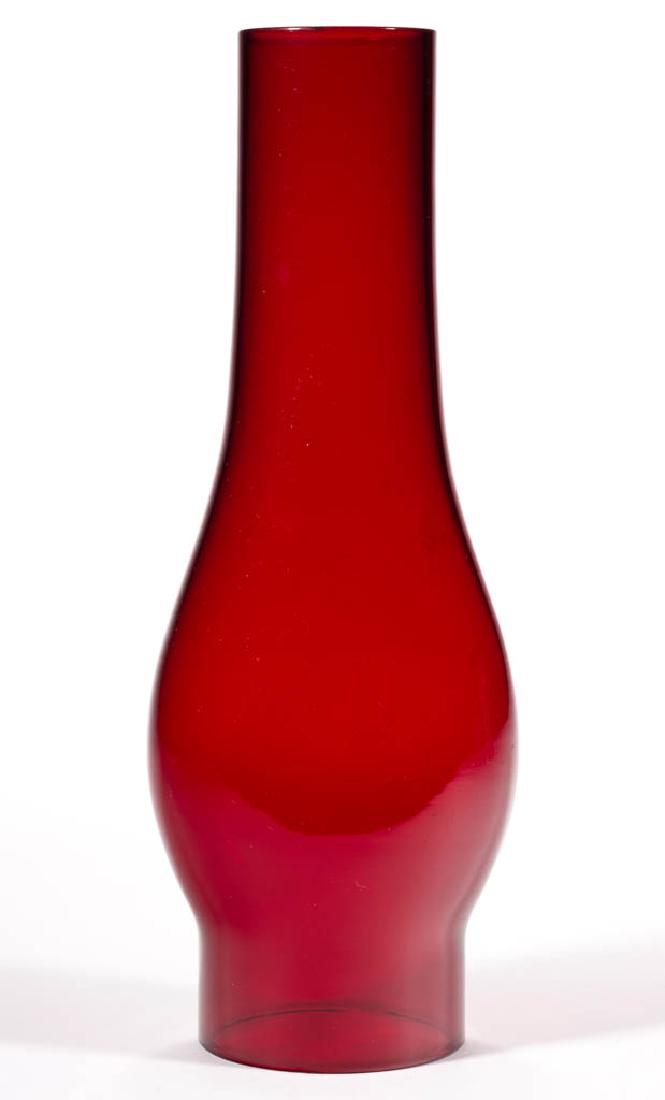 RUBY GLASS NO. 1 SLIP CHIMNEY: RUBY GLASS NO. 1 SLIP CHIMNEY, compressed bulge form. Second half 19th century. 9 1/2" H, 2 1/2" D fitter. Undamaged with minor wear. Provenance: From the private collection of J. W. "Bill" Courter, C
