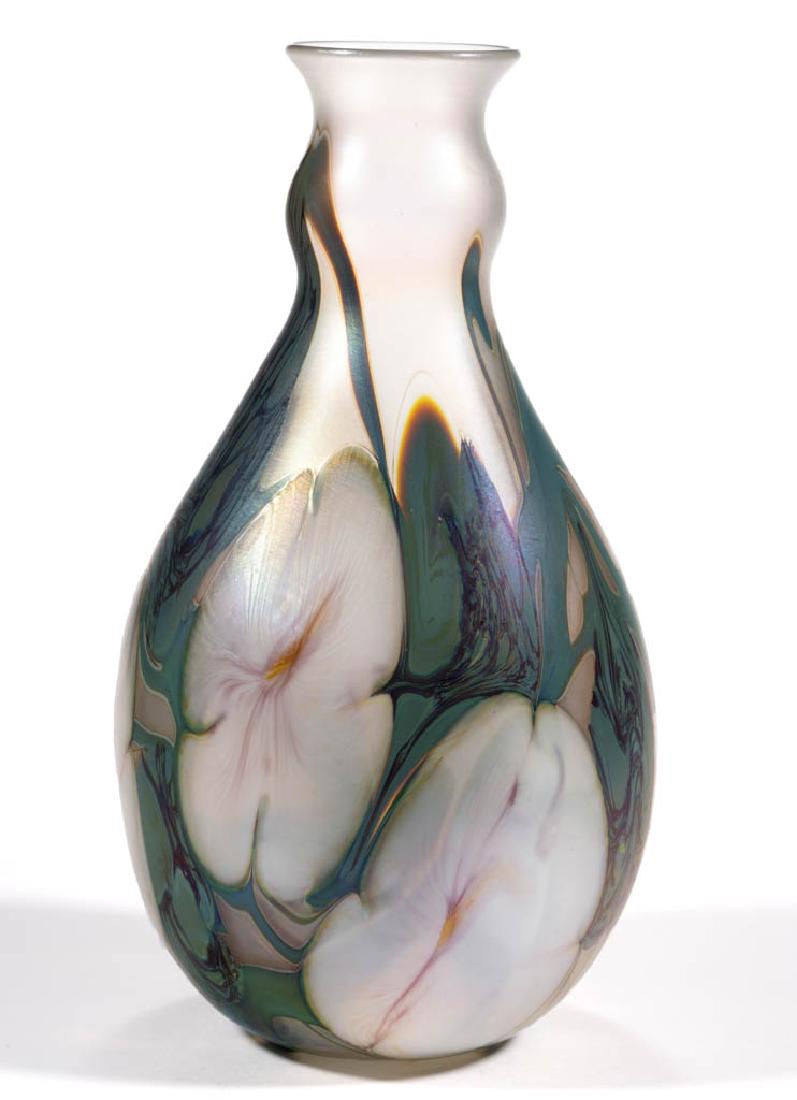 EARLY CHARLES LOTTON MULTI-FLORA STUDIO ART GLASS VASE: EARLY CHARLES LOTTON MULTI-FLORA STUDIO ART GLASS VASE, colorless iridescent with teal, opal, and light amethyst decoration, bottle form, polished pontil mark, signed "CHARLES LOTTON 1975/MULTI-FLORAL