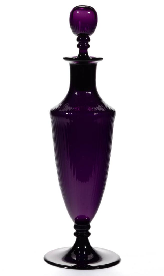 SIGNED LIBBEY FINE-RIB PERFUME BOTTLE: SIGNED LIBBEY FINE-RIB PERFUME BOTTLE, deep amethyst, tall urn form with a circular foot, matching stopper, acid-stamped signature. Libbey Glass Manufacturing Co. First quarter 20th century. 10 1/2" H