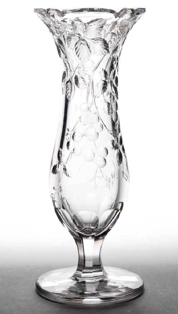 AMERICAN INTAGLIO CUT GLASS LARGE VASE: AMERICAN INTAGLIO CUT GLASS LARGE VASE, colorless, baluster form cut with hanging blackberry vines, raised on a panel-cut stem and circular foot with wide polished pontil mark. Possibly Hawkes Gravic.