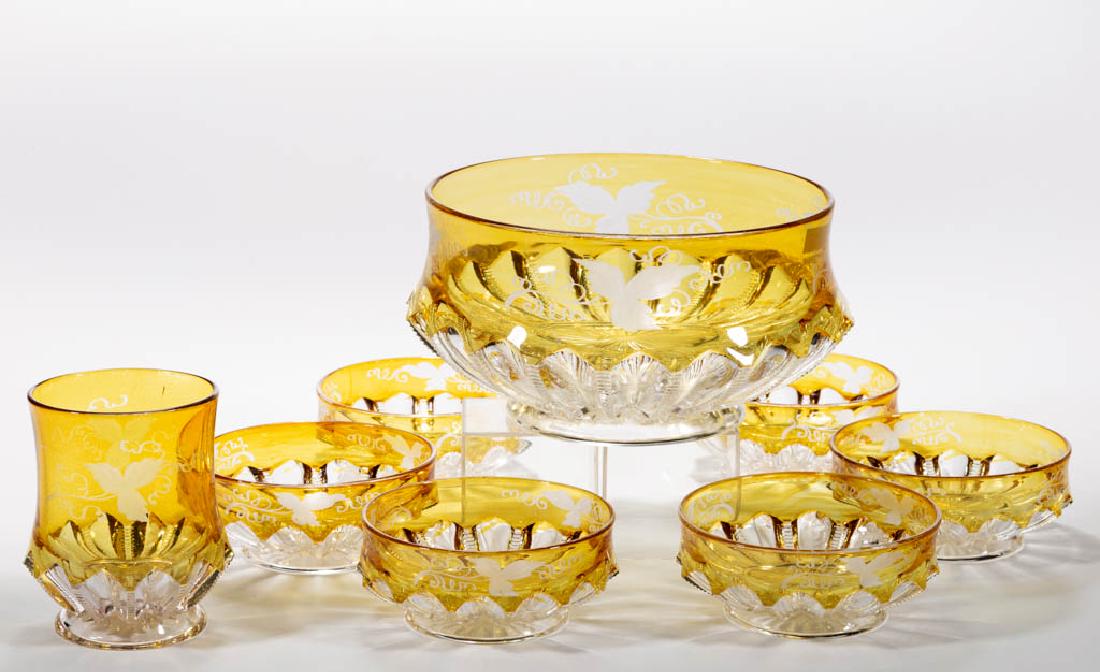 DUNCAN NO. 2005 / ZIPPER SLASH - AMBER-STAINED TABLE: DUNCAN NO. 2005 / ZIPPER SLASH - AMBER-STAINED TABLE ARTICLES, LOT OF EIGHT, colorless with matching engraved decoration, comprising a spooner and a seven-piece berry set. Geo. Duncan's Sons & Co. Cir