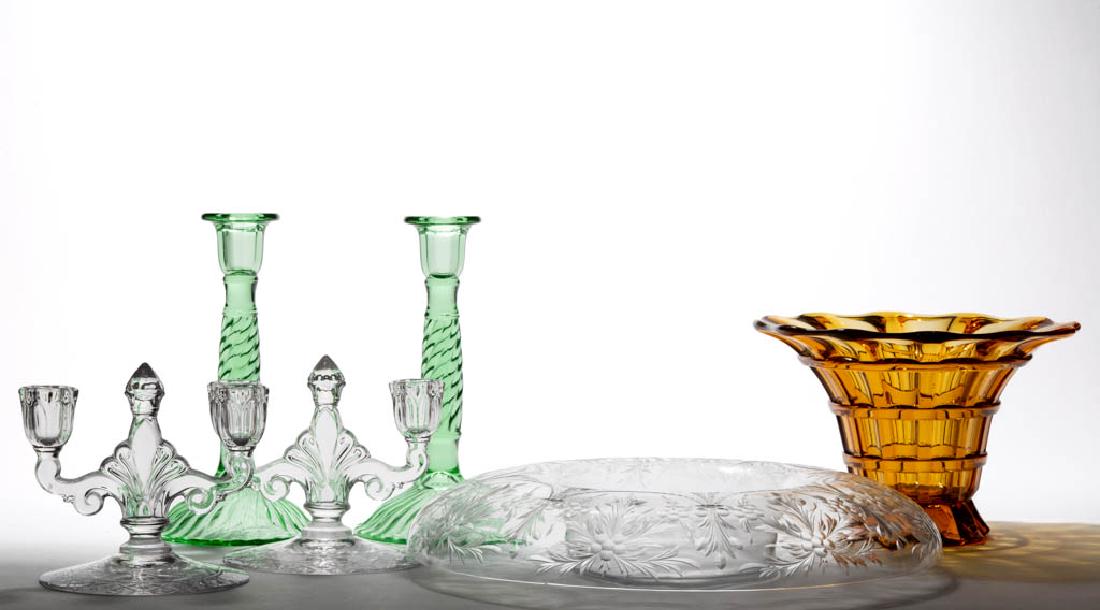 ASSORTED GLASS ARTICLES, LOT OF SIX: ASSORTED GLASS ARTICLES, LOT OF SIX, comprising a pair of green swirl candlesticks, an amber Art Deco vase with polished table ring, and a three-piece cut console set. First half 20th century. Bowl 14