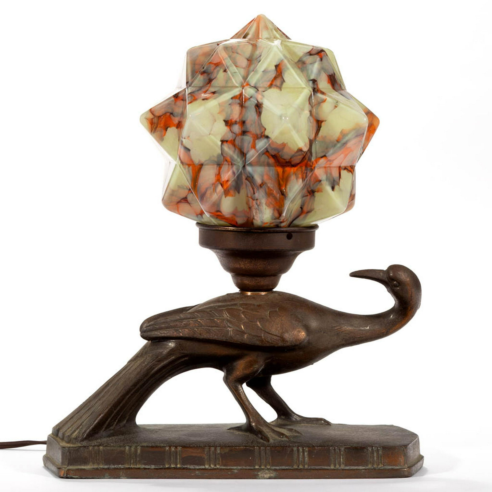 FIGURAL BIRD FORM METAL ELECTRIC TABLE LAMP: FIGURAL BIRD FORM METAL ELECTRIC TABLE LAMP, standing bird looking toward its back, rectangular base. Fitted with a Czech mottled geometric star shade. Maker unverified. 20th century. 12 3/4" HOA, 4" 