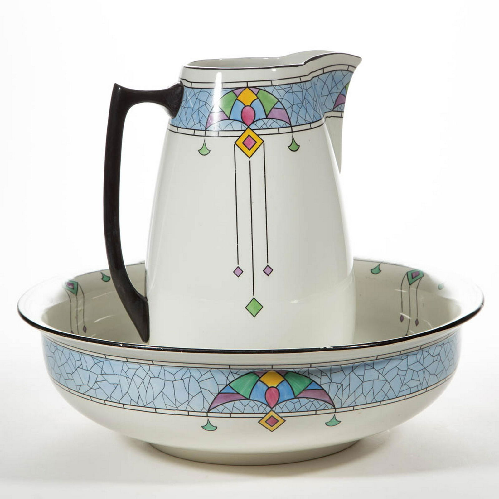 ENGLISH SHELLEY ART DECO WASH PITCHER AND BASIN: ENGLISH SHELLEY ART DECO WASH PITCHER AND BASIN, having a broad light blue top band with abstract line decorations and pastel polychrome geometric designs including diamonds and fans. Green printed ma