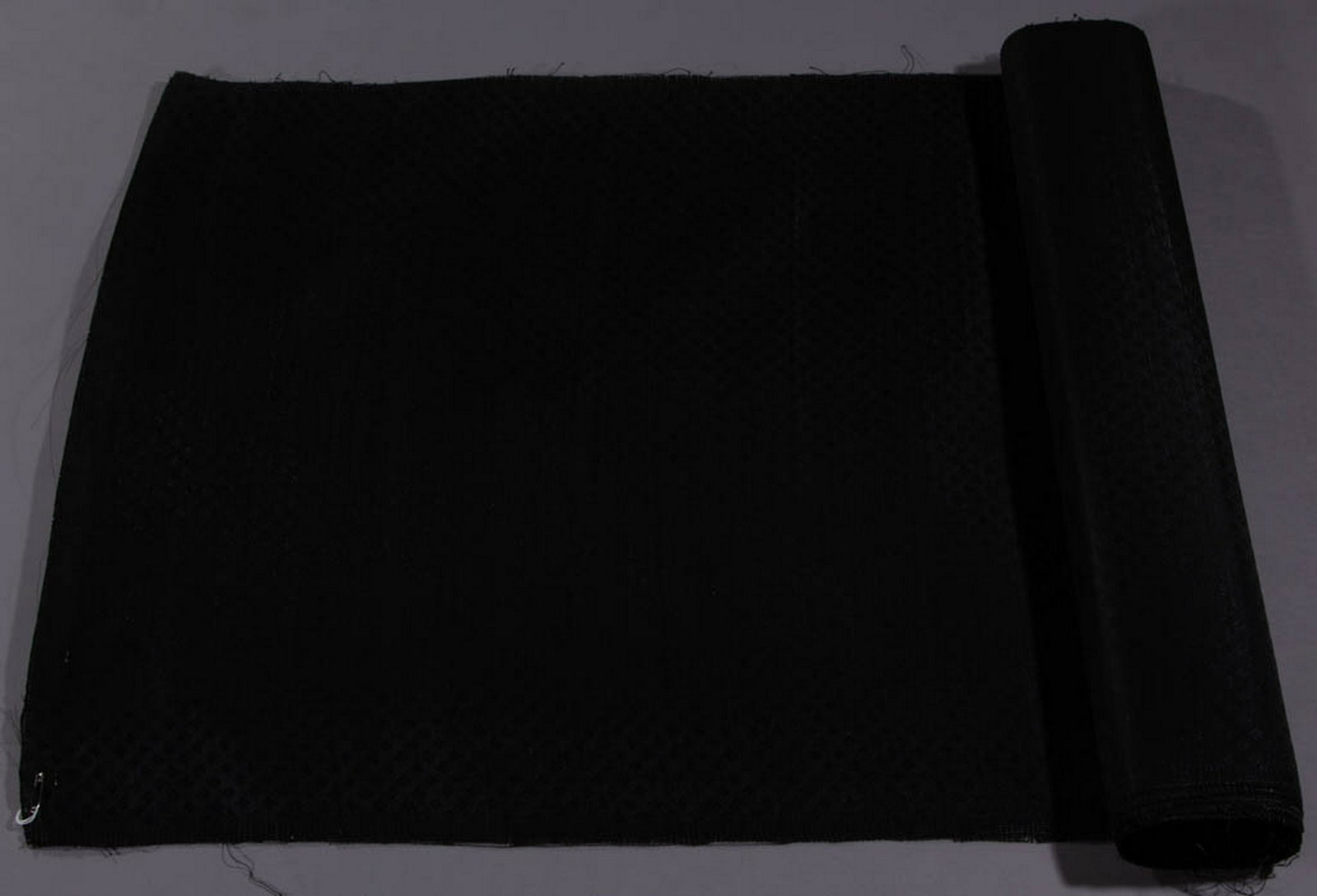 DAMASK HORSEHAIR FABRIC YARDAGE: DAMASK HORSEHAIR FABRIC YARDAGE, black, overall diaper-work damask pattern having horsehair weft, approximately 12 yards in length. 20th century. 434" x 28". Excellent overall condition with some loos