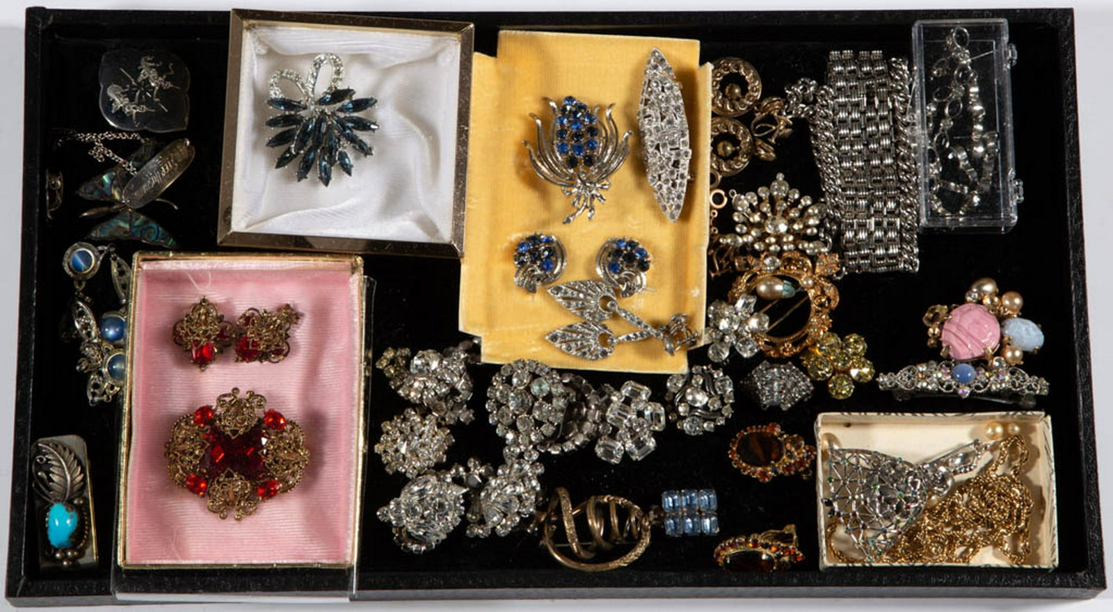 ASSORTED STERLING SILVER AND COSTUME JEWELRY, UNCOUNTED: ASSORTED STERLING SILVER AND COSTUME JEWELRY, UNCOUNTED LOT, more than 40 pieces, including five marked sterling pieces featuring a Mexican butterfly brooch, several pieces with rhinestones, two clip-