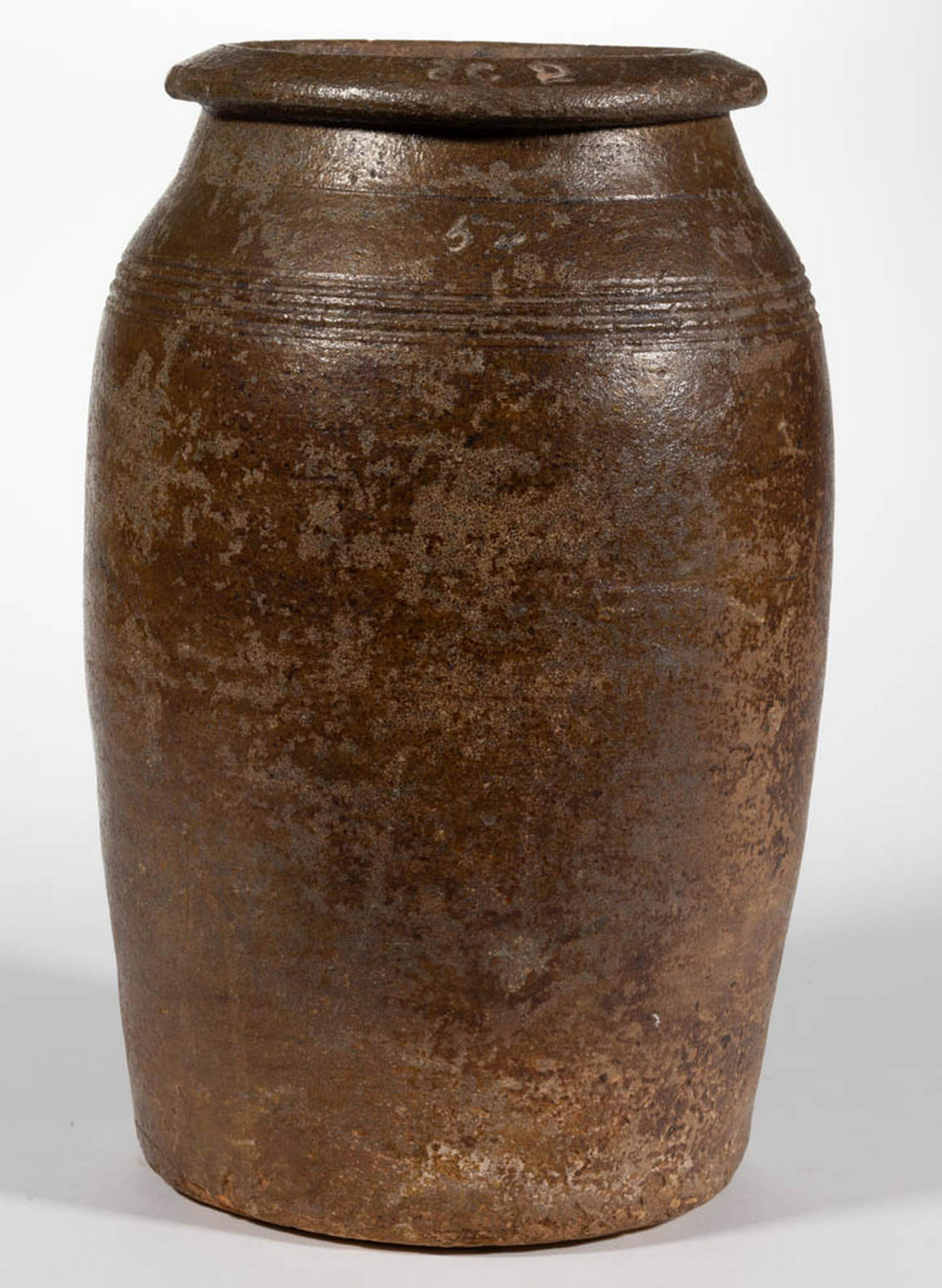 STAMPED "JC" SOUTHERN STONEWARE JAR: STAMPED "JC" SOUTHERN STONEWARE JAR, salt-glazed, "2" gallon capacity mark, slightly ovoid form with angled rim, and five incised shoulder rings. Stamped "JC 2" to rim and inscribed "50" to shoulder. 