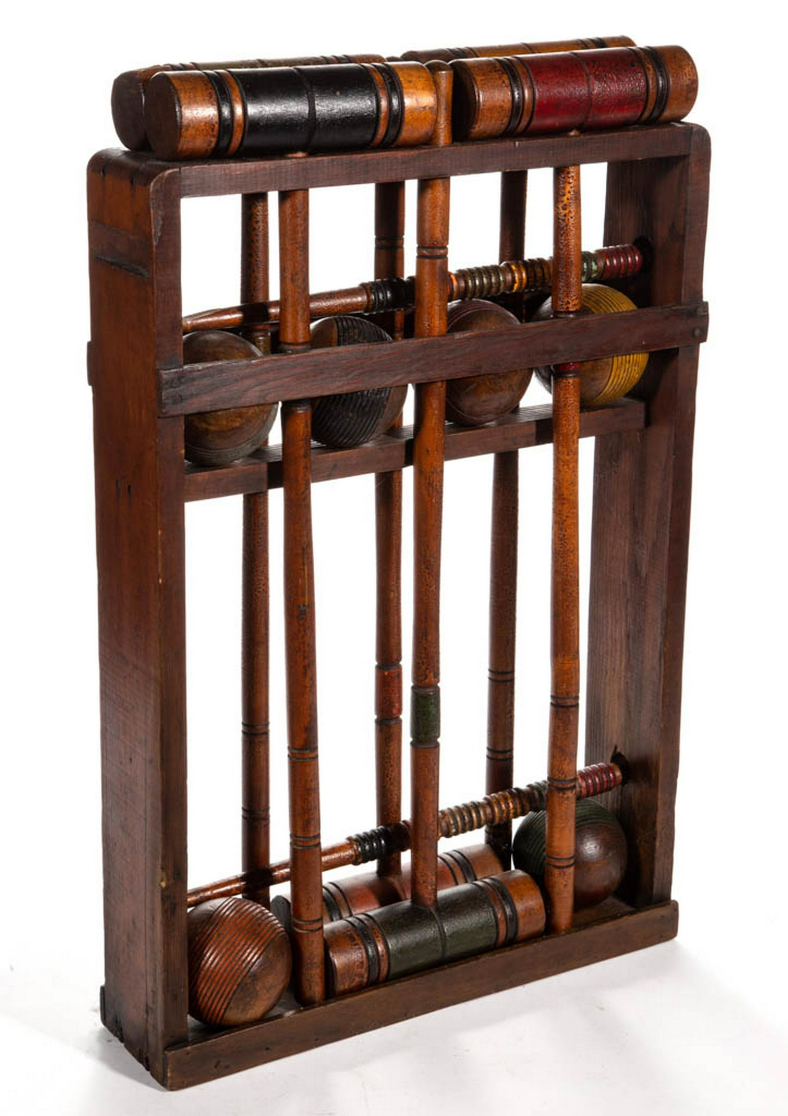 VINTAGE CROQUET SET: VINTAGE CROQUET SET, comprising six mallets and six balls with fitted stand. Retains likely original painted and varnished surface. First quarter 20th century. 26" HOA, 16 1/2" LOA (including stand). 
