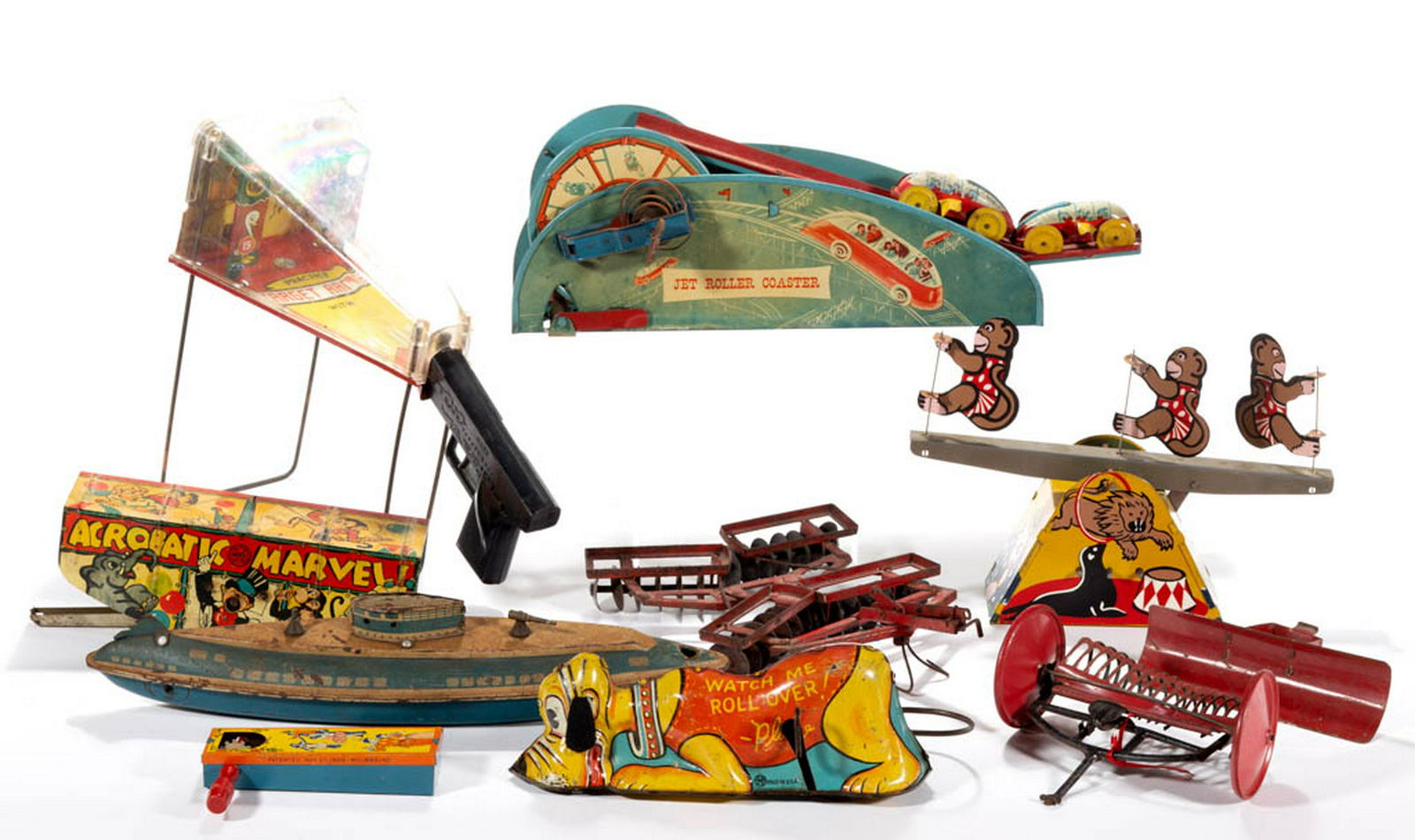 ASSORTED VINTAGE TOYS, LOT OF TEN: ASSORTED VINTAGE TOYS, LOT OF TEN, including a Marx Target Range game, a Disney Products Roll-Over Pluto, and a Lewco Products circus toy. First half 20th century. Marx Shooting Range 9 3/4" HOA, 11 1