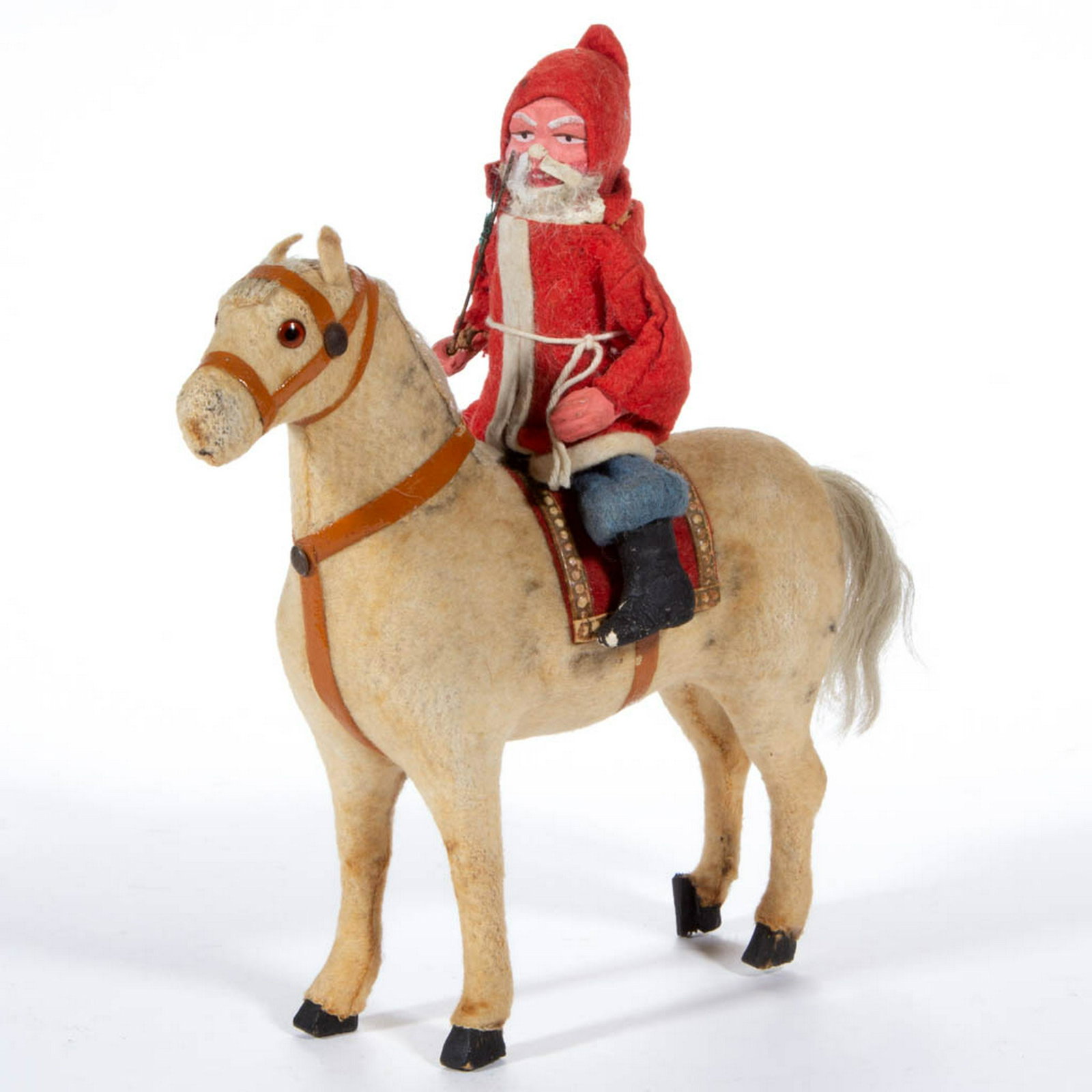 GERMAN SANTA CLAUS ON HORSE CANDY CONTAINER: GERMAN SANTA CLAUS ON HORSE CANDY CONTAINER, composition Santa figure wearing felt clothing with head unattached to reveal a small candy container, felt-covered horse with glass eyes, a felt saddle, c