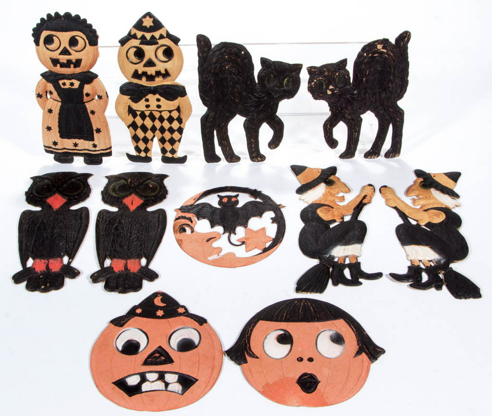 GERMAN DIE-CUT EMBOSSED CARDBOARD HALLOWEEN: GERMAN DIE-CUT EMBOSSED CARDBOARD HALLOWEEN DECORATIONS, LOT OF 11, comprising a pair of black cats, a pair of witches, a pair of owls, a pair of jack-o-lanterns, a pair of anthropomorphized figures w
