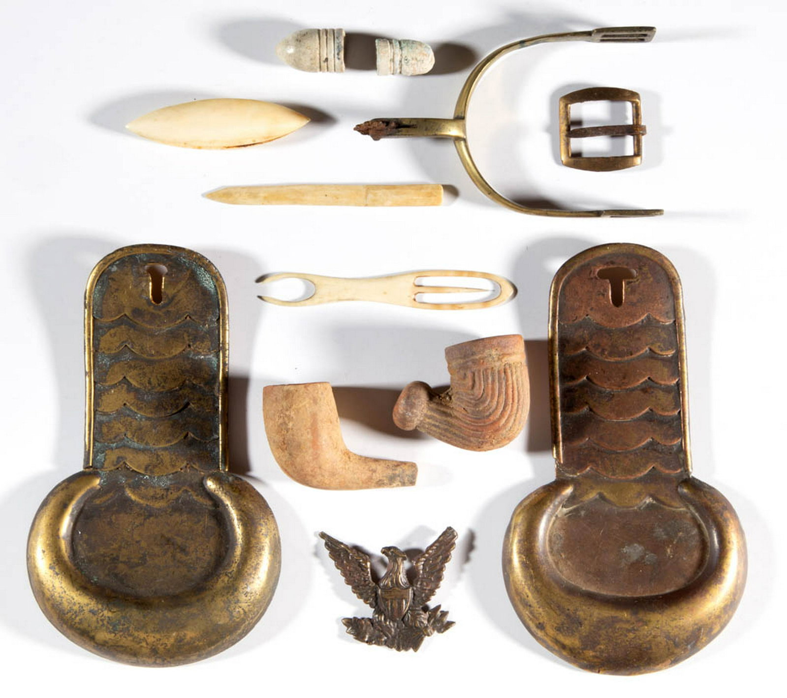 ASSORTED CIVIL WAR EXCAVATED ACCOUTREMENTS, LOT OF 12: ASSORTED CIVIL WAR EXCAVATED ACCOUTREMENTS, LOT OF 12, including a possible pair of epaulettes, hat pin, and one spur lacking rowel. Circa 1862. Hat pin 2" W. Good excavated condition, epaulettes and 