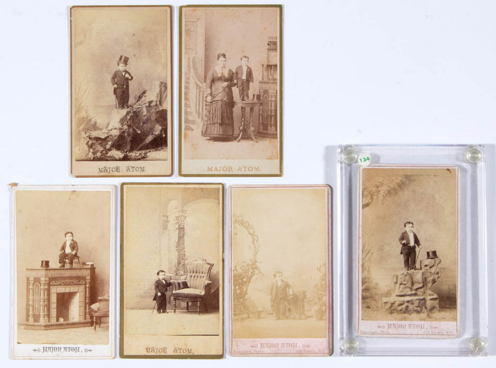CIRCUS / SIDESHOW PERFORMER CARTES DE VISITE, LOT OF: CIRCUS / SIDESHOW PERFORMER CARTES DE VISITE, LOT OF SIX, each featuring Major Atom, and taken by photographer Chas. Eisenmann, Bowery, New York. One is stamped on the back "MAJOR ATOM / SMALLEST / Ch