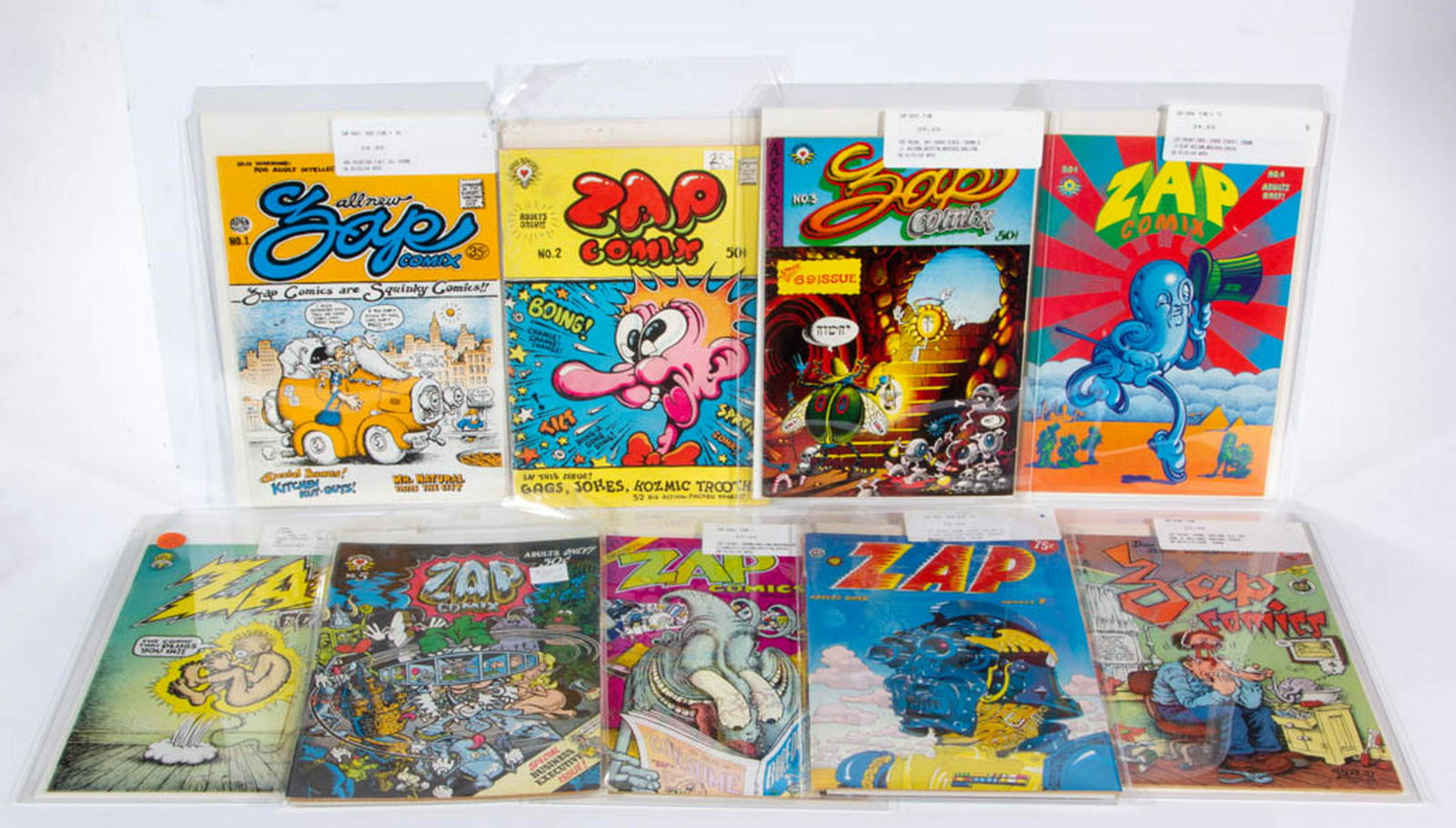 ASSORTED ZAP COMIC BOOKS, LOT OF NINE: ASSORTED ZAP COMIC BOOKS, LOT OF NINE, including a first print from Gilbert Shelton, Spain. Circa 1970. Primarily fine condition.Provenance: From the John Alliston Collection, Staunton, VA.