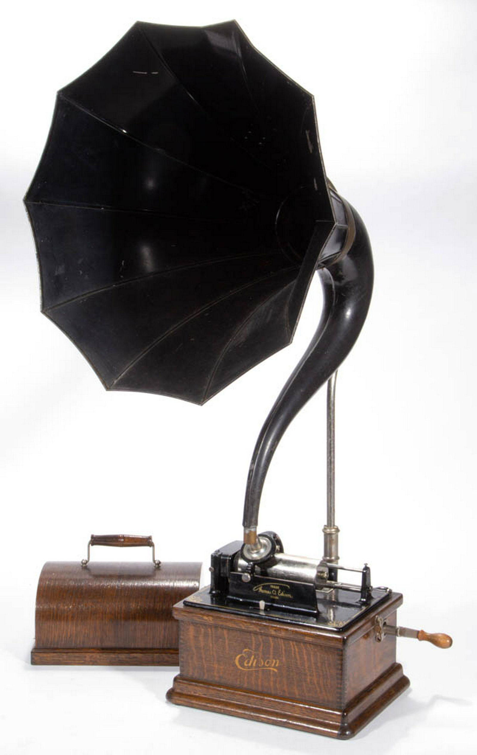 EDISON FIRESIDE COMBINATION TYPE PHONOGRAPH: EDISON FIRESIDE COMBINATION TYPE PHONOGRAPH, Model A, housed in an oak case, serial number 58293. Circa 1909. 35" HOA, case 9" x 11 1/2" OA.Very good overall condition, with areas of expected usage we