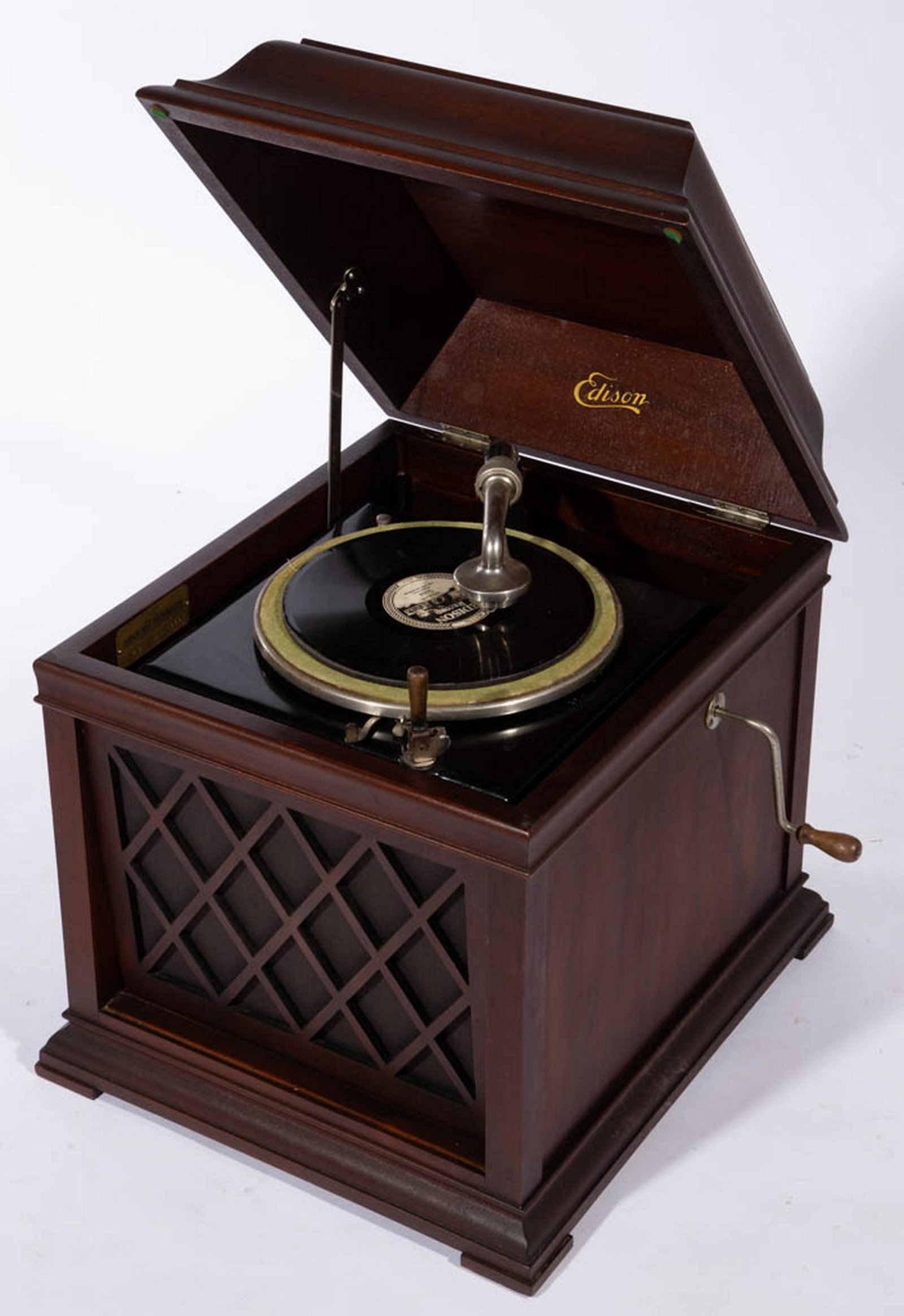 EDISON "CHALET" PHONOGRAPH: EDISON "CHALET" PHONOGRAPH, Model B19, front case with cross-hatch pattern, serial number 18837, with hand crank. Retains original varnished surface. With "Susie" disc. Two pieces total. First quarter