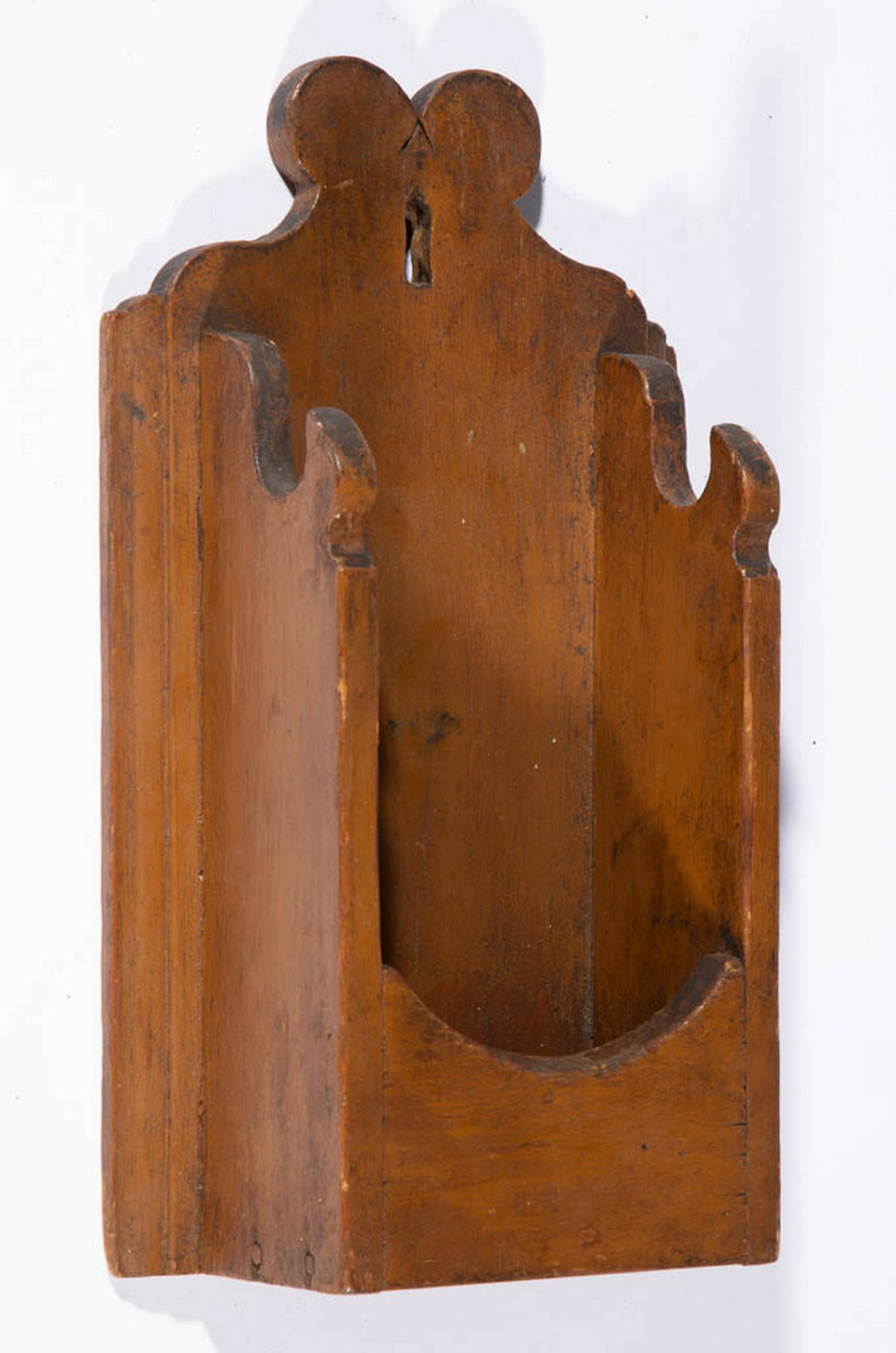SOUTHERN PAINTED YELLOW PINE PIPE / WALL BOX: SOUTHERN PAINTED YELLOW PINE PIPE / WALL BOX, nailed construction, with shaped backboard, and cut-outs on the sides. Retains an old mustard-brown-painted surface. 19th century. 13 3/4" HOA, 7 3/4" W, 