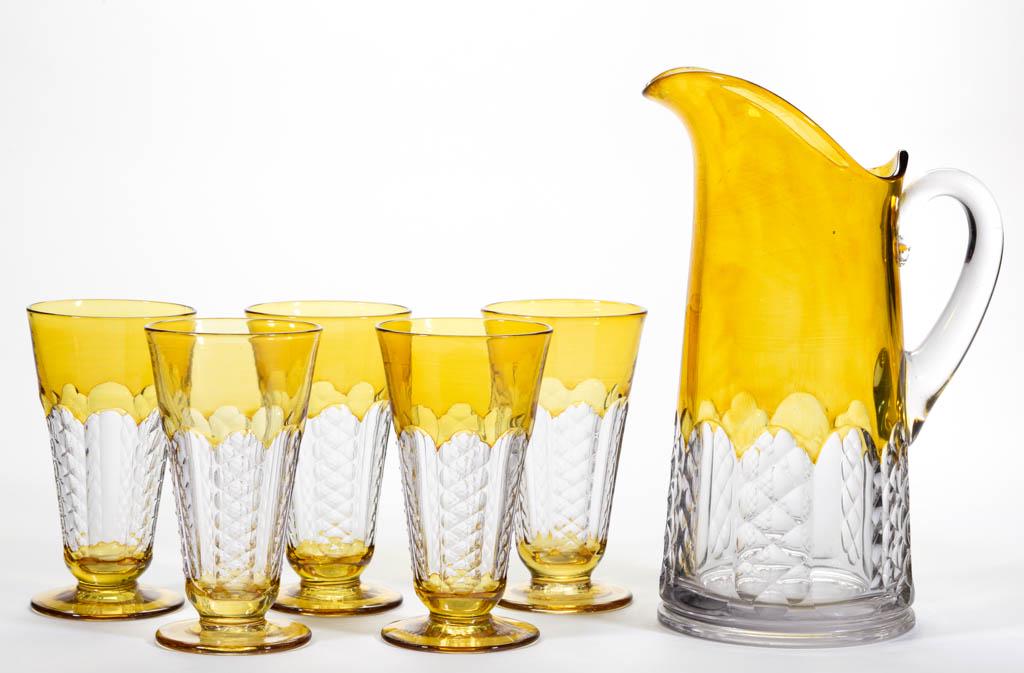 ADORIA - AMBER-STAINED SIX-PIECE ICED TEA SET: ADORIA - AMBER-STAINED SIX-PIECE ICED TEA SET, colorless, comprising a pitcher with applied handle and five iced tea tumblers. Co-Operative Flint Glass Co. Pattern introduced 1922. Pitcher 10 3/4" HOA