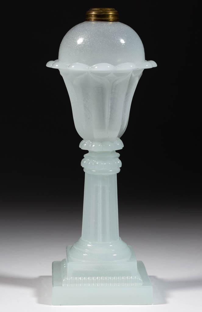 PRESSED TULIP AND COLUMN WHALE OIL / FLUID STAND LAMP: PRESSED TULIP AND COLUMN WHALE OIL / FLUID STAND LAMP, alabaster/clambroth dome-top font with a lightly sanded surface, raised on a fluted columnar standard and square double-step base with 17 beads o