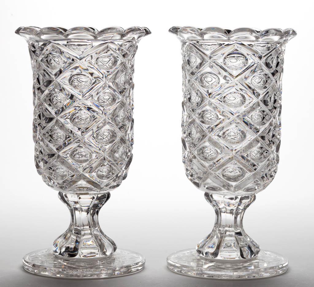 DIAMOND THUMBPRINT CELERY VASES, LOT OF TWO: DIAMOND THUMBPRINT CELERY VASES, LOT OF TWO, colorless lead glass, each having a 12 scallop rim, short lobed stem, circular patterned foot. Boston & Sandwich Glass Co. and others. 1850-1870.9 1/8" HOA