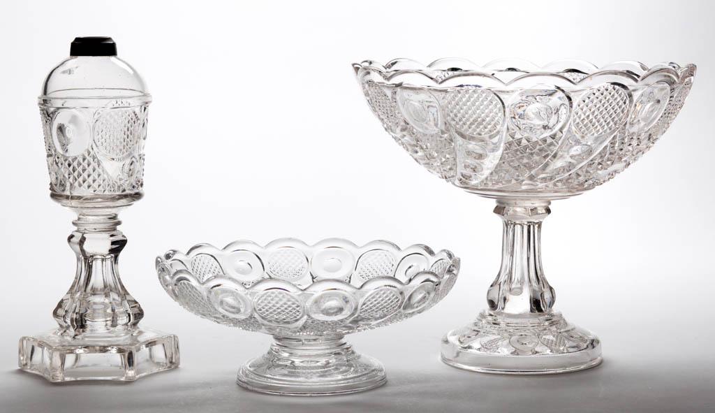 HORN OF PLENTY / COMET (OMN) ARTICLES, LOT OF THREE: HORN OF PLENTY / COMET (OMN) ARTICLES, LOT OF THREE, colorless lead glass, comprising two open compotes and a stand lamp with brass fine-line collar. M'Kee & Bros., Boston & Sandwich Glass Co., and pr