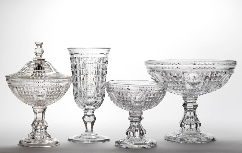 WAFFLE AND THUMBPRINT / PALACE (OMN) TABLE ARTICLES,: WAFFLE AND THUMBPRINT / PALACE (OMN) TABLE ARTICLES, LOT OF FOUR, colorless lead glass, comprising a covered sweetmeat, a celery vase, and two open compotes. Pittsburgh and New England. 1850-1870.6" t