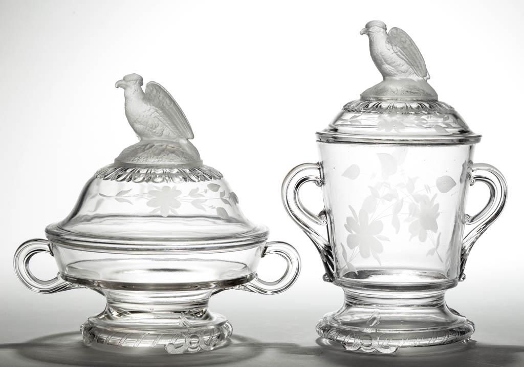 FROSTED EAGLE / OLD ABE TABLE ARTICLES, LOT OF TWO: FROSTED EAGLE / OLD ABE TABLE ARTICLES, LOT OF TWO, colorless with frosted finial and matching engraved decoration, comprising a covered butter dish and covered sugar bowl. Crystal Glass Co. Circa 188