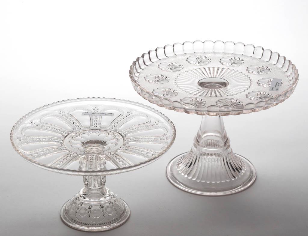 ASSORTED EAPG CAKE STANDS, LOT OF TWO: ASSORTED EAPG CAKE STANDS, LOT OF TWO, colorless, comprising a Roman Rosette and a Wisconsin. Various makers. Late 19th/early 20th century.Roman Rosette 6 1/2" H, 9 1/4" D rim, 5 1/4" D foot. Undamage