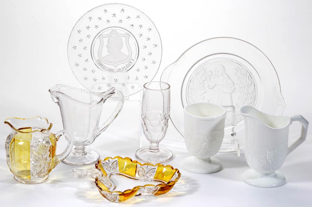 ASSORTED EAPG ARTICLES, LOT OF EIGHT: ASSORTED EAPG ARTICLES, LOT OF EIGHT, colorless, opaque white/milk glass, and amber-stained, including a Riverside Brilliant creamer and condiment tray, a McKeinley "Protection and Plenty" plate, an E