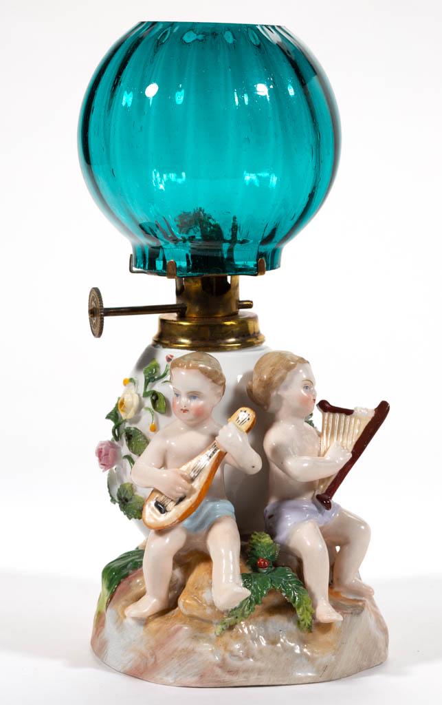 PORCELAIN ERNST BOHNE SOHNE MUSICAL CHILDREN FIGURAL: PORCELAIN ERNST BOHNE SOHNE MUSICAL CHILDREN FIGURAL MINIATURE LAMP, depicting two young children on a rock formation, each with a musical instrument adjacent to an egg-form font with applied bisque f