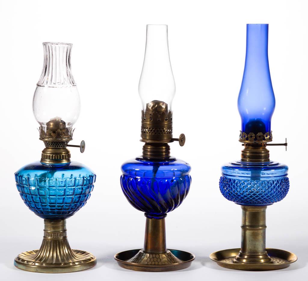 ASSORTED PRESSED PATTERN MINIATURE STAND LAMPS, LOT OF: ASSORTED PRESSED PATTERN MINIATURE STAND LAMPS, LOT OF THREE, blue fonts, brass bases, comprising a Waffle/Smith I, fig. 117; a Rib Swirl/Smith II, fig. 155; and a Tiny Diamond Font/Smith II, fig. 156
