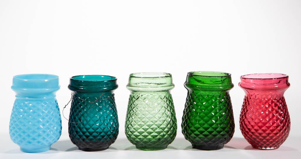 DIAMOND-PATTERN MOLDED GLASS CHRISTMAS LIGHTS, LOT OF: DIAMOND-PATTERN MOLDED GLASS CHRISTMAS LIGHTS, LOT OF FIVE, comprising ruby cased, opaque powder blue, teal, emerald green, and light green examples. Fourth quarter 19th/first quarter 20th century. 3 