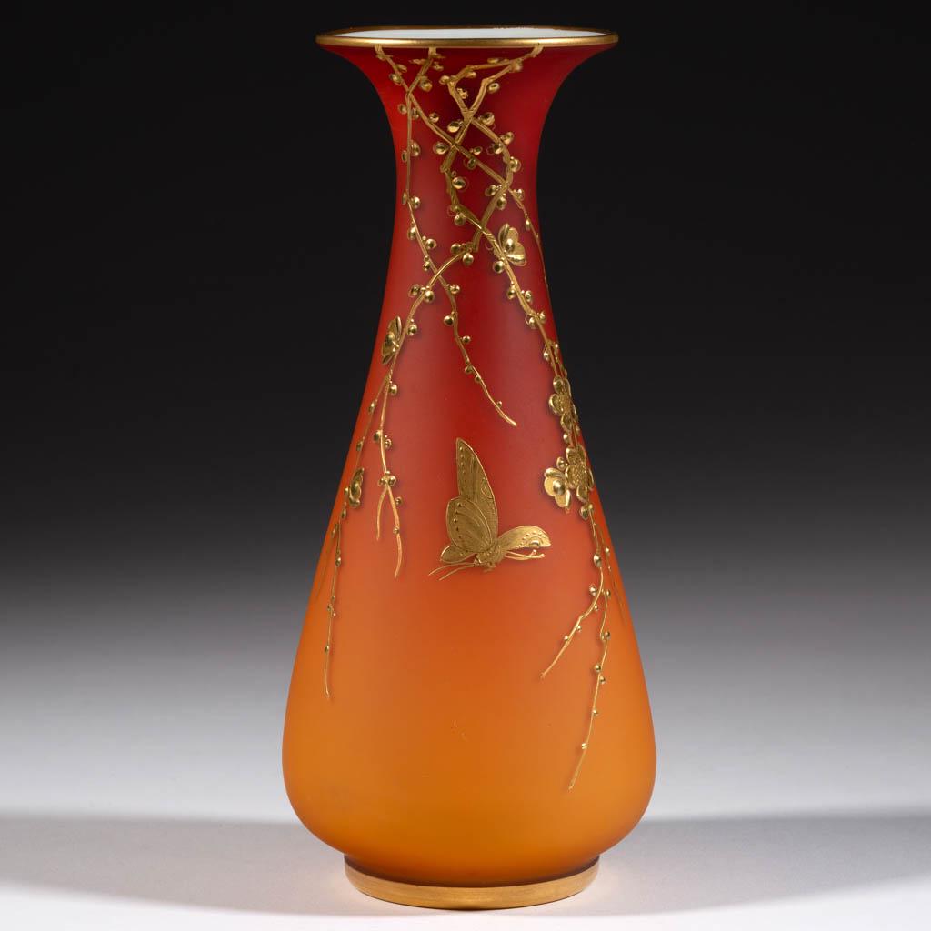 THOMAS WEBB SATIN PEACHBLOW / AMBERINA VASE: THOMAS WEBB SATIN PEACHBLOW / AMBERINA VASE, shaded orange to red with an opaque white interior, gold-enamel decoration, bottle form with decoration depicting consisting of flowering branches and a fl