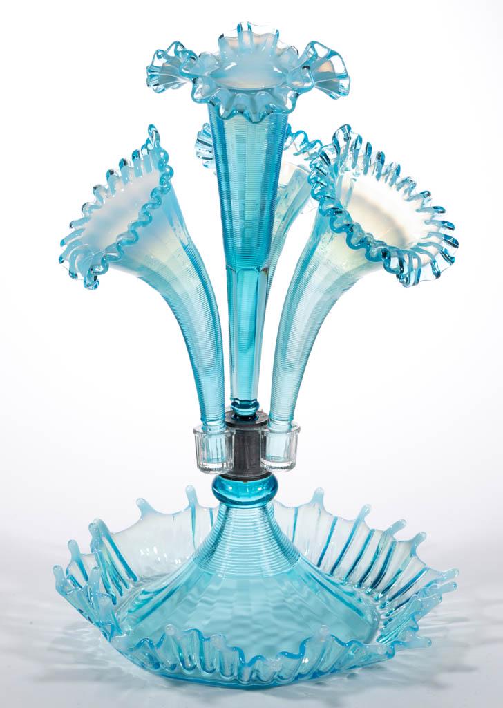 L. G. WRIGHT / FENTON PRESSED GLASS EPERGNE: L. G. WRIGHT / FENTON PRESSED GLASS EPERGNE, blue opalescent, crimped- and ruffled-rim bowl fitted with a central trumpet-form vase surrounded by three Jack-in-the-Pulpit vases. Fenton Art Glass Co. f
