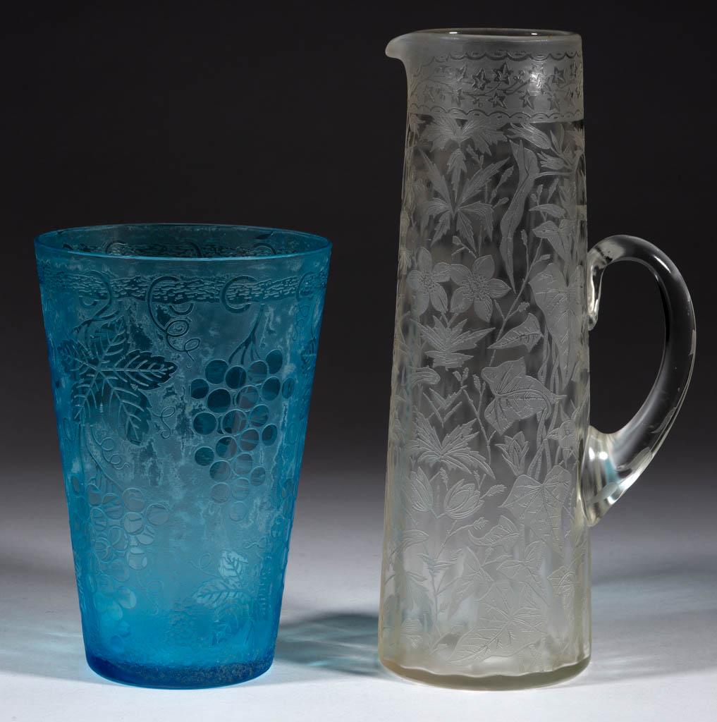 VICTORIAN ETCHED GLASS ARTICLES, LOT OF TWO: VICTORIAN ETCHED GLASS ARTICLES, LOT OF TWO, colorless and blue, comprising a tankard pitcher with applied etched handle and a tapered vase. Maker unverified. Late 19th/first quarter 20th century. Pit