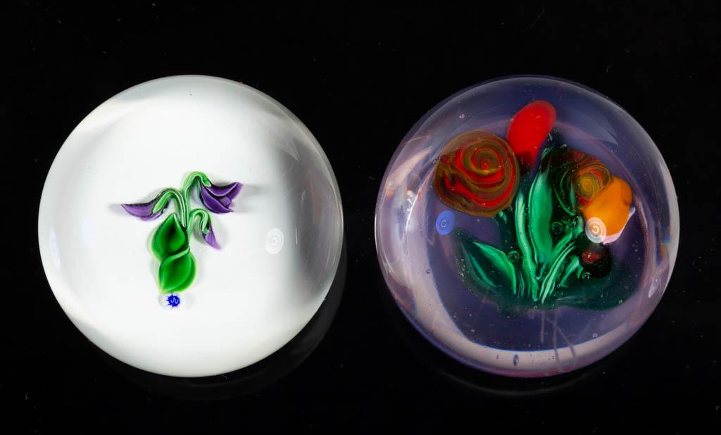 ASSORTED LAMPWORK STUDIO ART GLASS MINIATURE: ASSORTED LAMPWORK STUDIO ART GLASS MINIATURE PAPERWEIGHTS, LOT OF TWO, colorless, including a Frances Whittemore blooming amethyst flowers on a white ground, and a Ronald Hansen multi-floral with pale